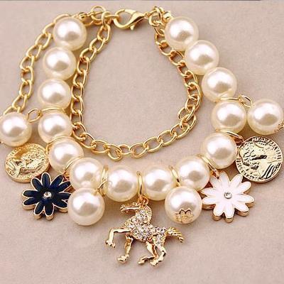 Pulsera Flor de Perla – Glamour y Sofisticación
