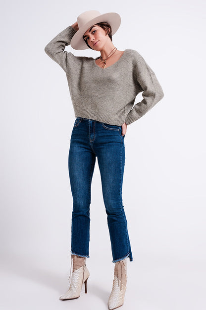 High-waist jeans with asymmetric hem